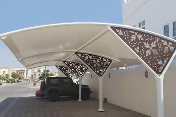 The Arch cantilever car parking shade prevents the vehicle dashboard from fading, protects car electronics, minimizes the accumulation of heat in the car, enhance the value of your property, enhances your business image, avoids screen cracking, and the luster and shine of your car will last. Arch cantilevers offer shade over places that require clear space, such as sidewalks, bus stops, and automobile parking, among other things. Tent Shed Group of Companies (MGC) is a major supplier and installation of high-quality, low-cost top-support cantilever vehicle parking blinds, whether single or double-sided.